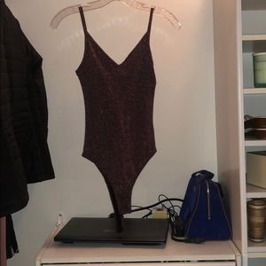Sparkle pink and black bodysuit from Topshop